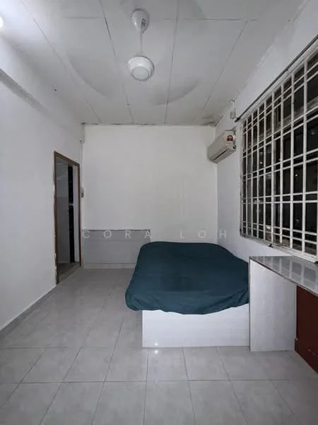Bedroom features: single bed with blue bedding, white walls, white tiled flooring, ceiling fan, wall-mounted air conditioning unit, window with metal grille, built-in desk with storage, natural light from window; style: minimalist.