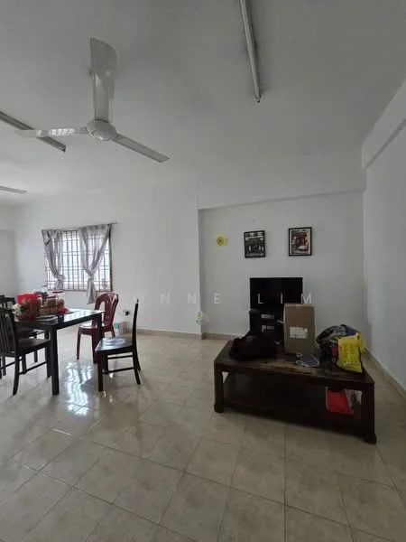 Living features: white painted walls, tile flooring, 5-blade ceiling fan, window with sheer curtains, TV console, wall-mounted TV, coffee table, dining table with chairs, decorative wall art, box storage, plastic chair, area rug.