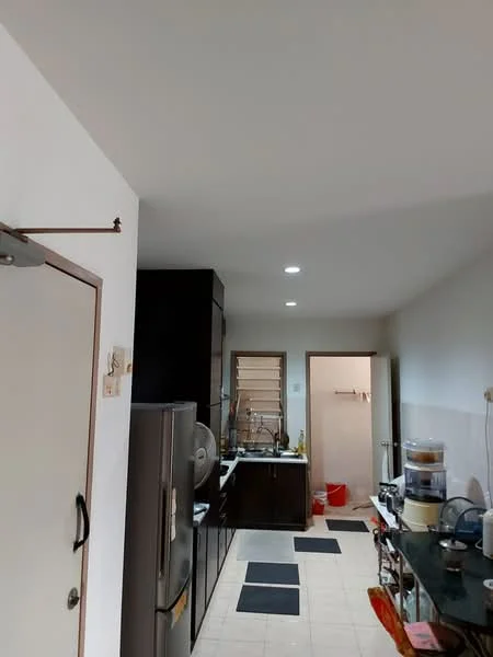 Kitchen features: white painted walls, tile flooring, dark wood cabinetry, stainless-steel fridge, built-in sink, countertop with space for appliances, recessed LED downlights, open shelving, kitchen utensils on countertop, wall-mounted fan; style: modern.