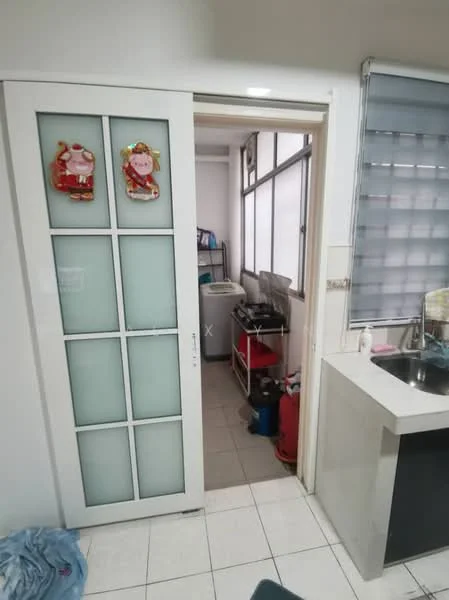 Kitchen features: white cabinetry with glass panels, stainless-steel sink, chrome faucet, countertop with a smooth surface, tile backsplash, white tiled flooring, window with blinds, laundry area visible, decorative wall hangings, open layout to adjacent room; style: modern.