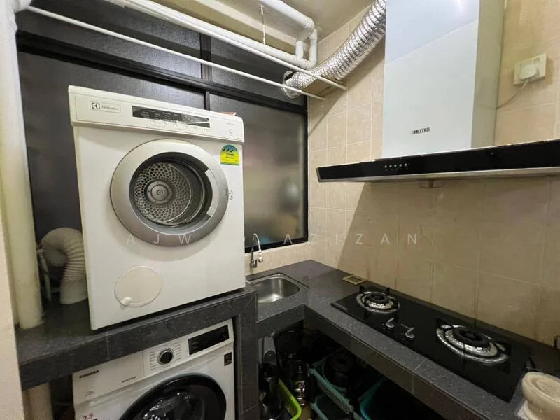 Laundry features: front-load washing machine, tumble dryer, stainless-steel sink, black countertop, two-burner gas hob, extraction hood, grey tiled walls, black cabinetry, visible plumbing pipes; style: modern.