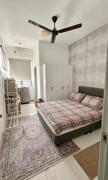 Bedroom features: king-size bed with grey upholstered frame, plaid bedding, ceiling fan with 5 blades, light grey accent wall with texture, white painted walls, built-in wardrobe with multiple doors, area rug with intricate pattern, window with sheer curtains, small refrigerator, clothes drying rack; style: modern.