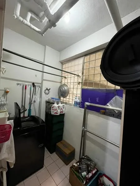 Laundry features: black front-load washing machine, metal drying rack, plastic storage bins, white wall-mounted shelves, tiled flooring, window with frosted glass, exposed pipes on ceiling, hanging clothesline.