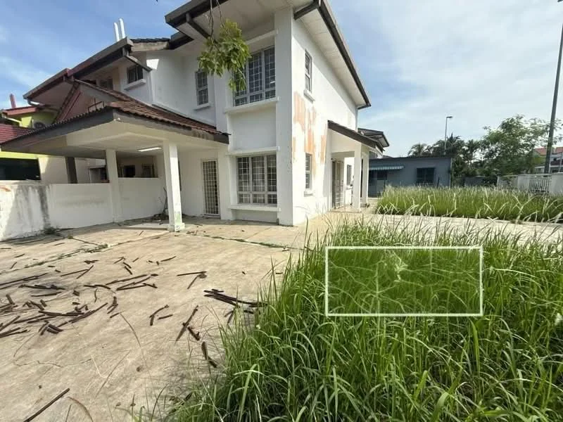 Exterior type: semi-detached house; features: two-storey structure, white painted facade, red tiled roof, front porch area, overgrown grass, concrete flooring, windows with grills, surrounding greenery, fenced perimeter, visible neighboring houses; style: modern.