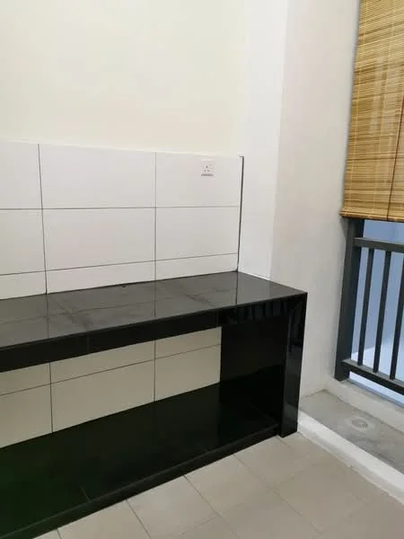 Room features: black countertop, white tiled backsplash, wall-mounted electrical outlet, light-colored walls, window with bamboo blinds, floor tiles, built-in cabinetry, open space; style: modern.