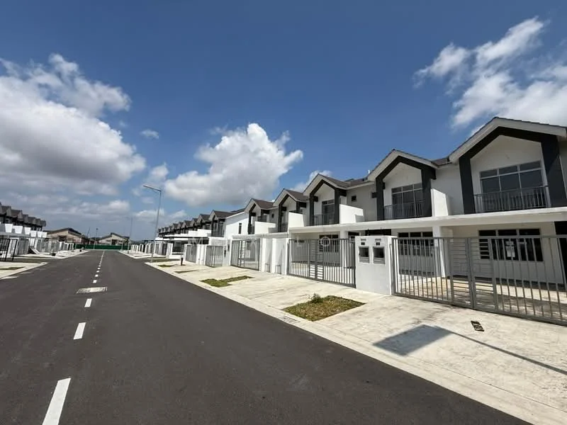 Exterior type: linked terrace house; features: two-storey linked terrace houses, white painted facade, black accents on facade, gated entry, paved driveway, manicured grass patches, street lighting, clear blue sky, asphalt road, sidewalks, balconies on upper floors; style: modern.