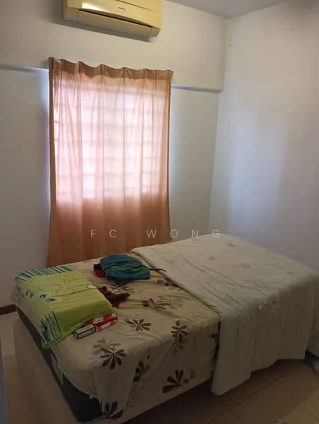 Bedroom features: queen-size bed, light-colored bedding, decorative bedspread with floral pattern, curtains in light orange, wall-mounted air conditioning unit, cream painted walls, tile flooring, bedside items including towels, window with natural light.