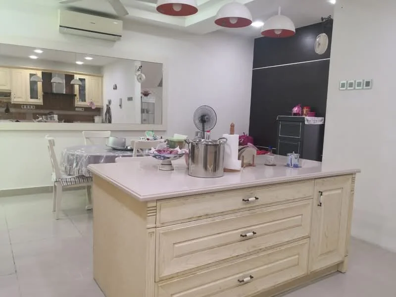 Kitchen features: island kitchen with countertop, white cabinetry with decorative paneling, stainless-steel sink, chrome faucet, built-in oven, refrigerator, pendant lighting, ceiling-mounted air conditioning unit, tile flooring, wall-mounted clock, open layout to dining area, mirrored backsplash, dining table with chairs; style: modern.