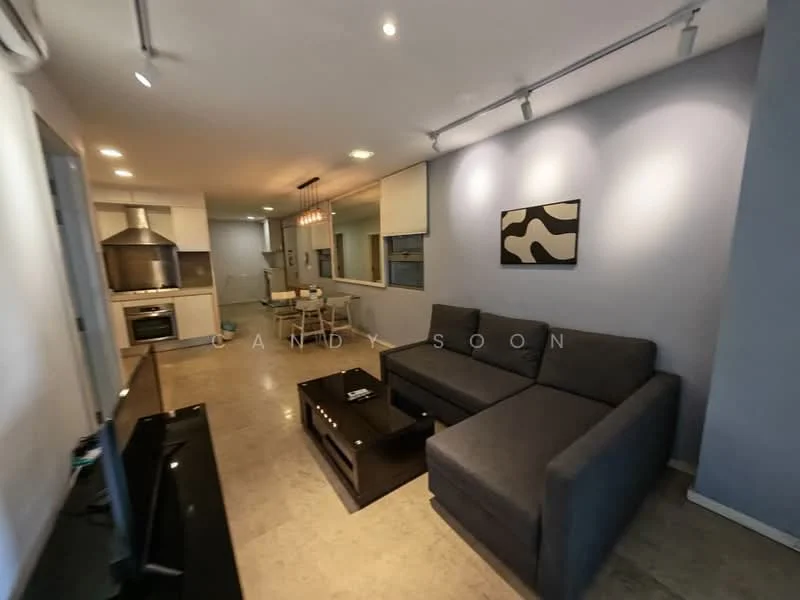 Living features: L-shape sectional sofa in grey, coffee table, TV console, wall-mounted TV, recessed downlights, cream painted walls, marble tile flooring, open layout to kitchen and dining area, decorative artwork on wall, large windows with natural light; style: modern. Kitchen features: stainless-steel range hood, built-in oven, freestanding range oven, kitchen cabinetry, countertop, open layout to living area; style: modern.