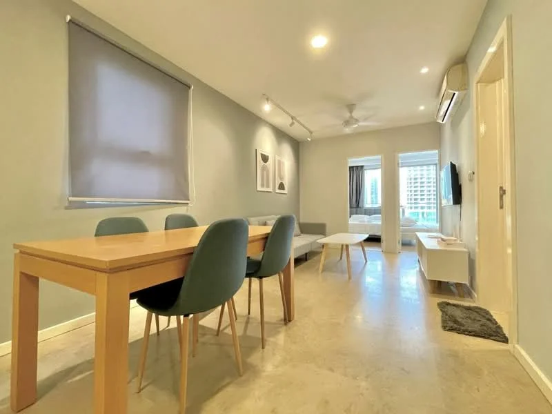 Living features: light grey painted walls, polished concrete flooring, 5-blade ceiling fan with light, floor-to-ceiling windows, sheer curtains, wall-mounted TV, sofa in grey fabric, coffee table, dining table with 4 green chairs, recessed downlights; style: modern; view: city.