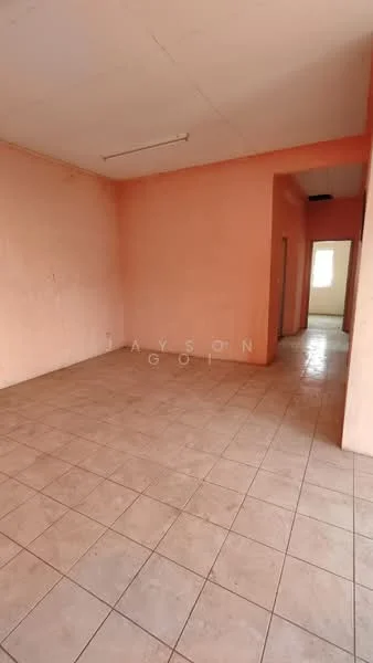 Room features: pink painted walls, ceramic tile flooring, fluorescent ceiling light, doorway leading to another room, window with natural light.