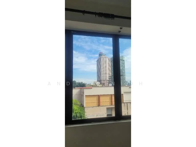 Room features: large floor-to-ceiling windows, city skyline view, natural light, white walls, neutral flooring; view: city.