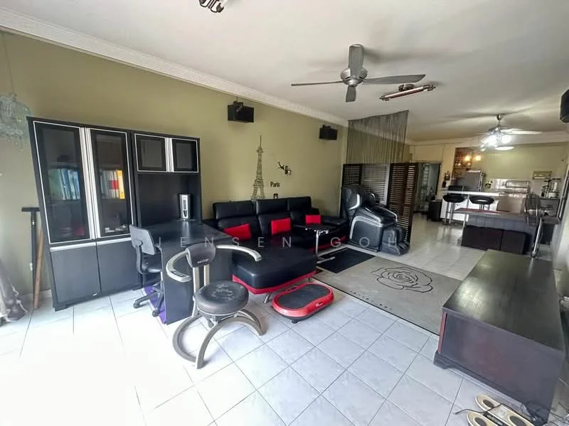 Living features: black leather sectional sofa, red accent cushions, black coffee table, area rug with floral pattern, wall-mounted TV, TV console, ceiling fan with light, white tiled flooring, decorative wall paneling, large window with sheer curtains; style: modern. Kitchen features: open kitchen layout, stainless-steel appliances, kitchen island, bar stools, white cabinetry, black countertops, recessed lighting; style: modern.
