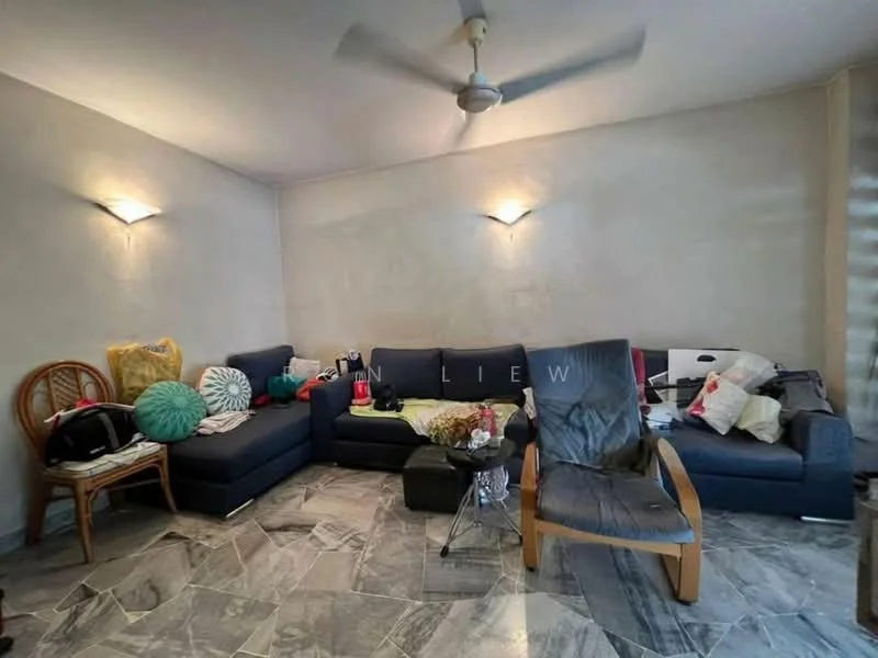 Living features: grey painted walls, marble tile flooring, 5-blade ceiling fan, L-shape sectional sofa in navy blue, decorative cushions, wooden armchair, glass coffee table, wall-mounted sconces, area rug, decorative items on sofa; style: modern.
