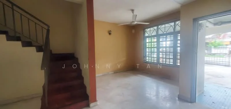 Living features: cream painted walls, marble tile flooring, 5-blade ceiling fan, large windows with grid pattern, staircase with wooden steps, door leading outside, natural light from windows, neutral color scheme.