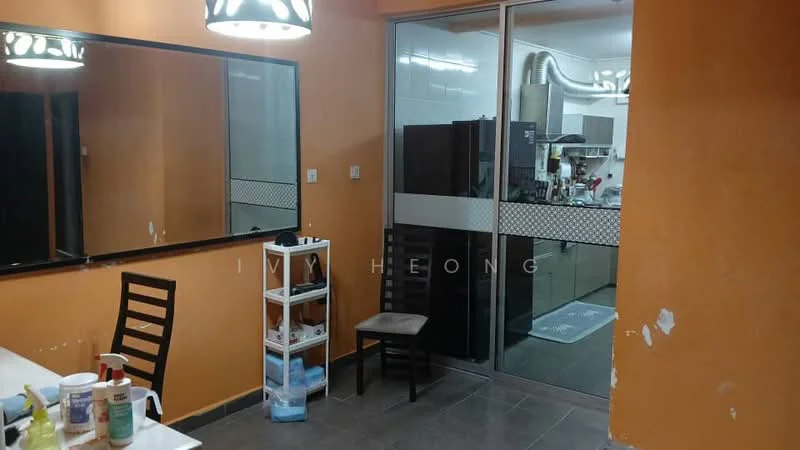 Dining features: orange painted walls, black framed mirror, dining table, wooden dining chairs, tile flooring, ceiling light fixture, open layout to kitchen, glass sliding door to kitchen. Kitchen features: black refrigerator, kitchen cabinetry, stainless-steel sink, kitchen countertop, kitchen appliances visible.