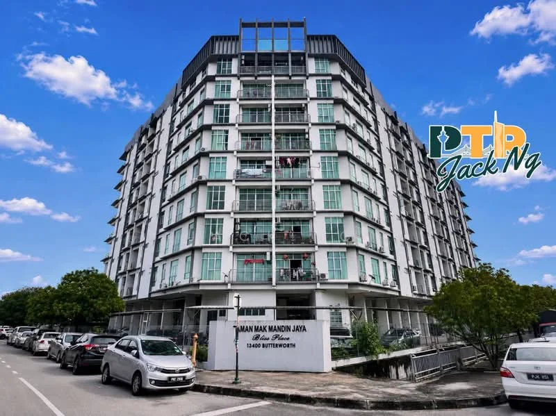Exterior type: mid-rise condominium; features: glass curtain wall, white painted facade, recessed balconies, approximately 6-storey, manicured landscaping, parking spaces visible, street view, signage at entrance; style: modern.