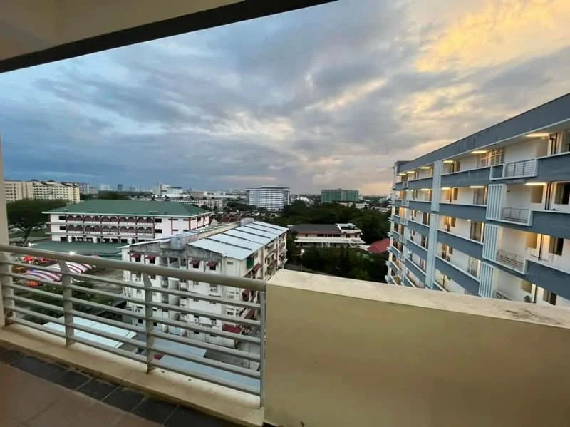 Room features: balcony with railing, concrete flooring, city skyline view, cloudy sky, surrounding buildings, outdoor space; view: city.