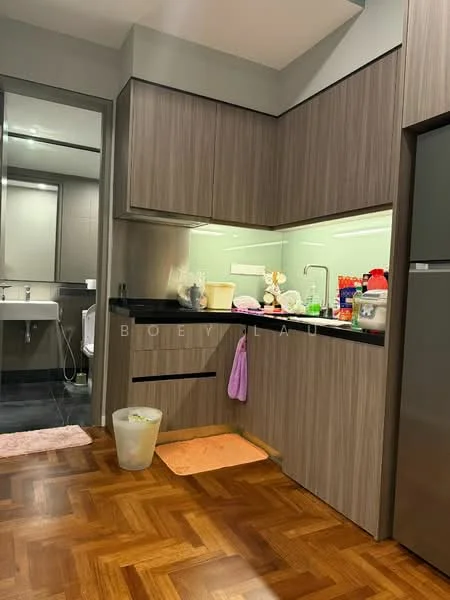 Kitchen features: wood cabinetry, black countertop, single-bowl stainless-steel sink, chrome pull-down faucet, built-in oven, freestanding range oven, refrigerator, tile backsplash, parquet wood flooring, under-cabinet lighting, kitchen towels, waste bin, appliances on countertop; style: modern.