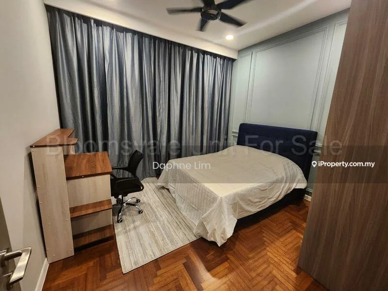 Bedroom features: queen-size bed with white bedding, upholstered headboard in blue, wooden flooring, grey curtains, ceiling fan, study desk, office chair, area rug with geometric pattern, wall-mounted light fixture; style: modern.