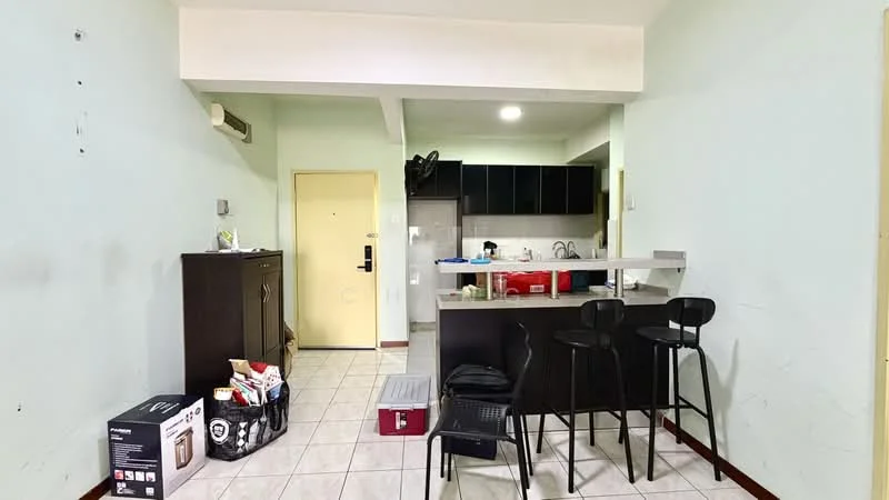 Kitchen features: light green painted walls, white tiled flooring, kitchen island with seating, black cabinetry, stainless-steel sink, chrome faucet, built-in appliances, open layout, recessed ceiling lights; style: modern. Living features: black bar stools, storage cabinet, open space layout, visible entrance door; style: modern.