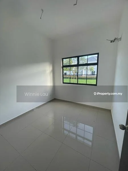 Room features: white painted walls, grey tiled flooring, large window with black frame, natural light from window, no visible furniture, plain ceiling, two ceiling hooks; style: modern; view: garden.