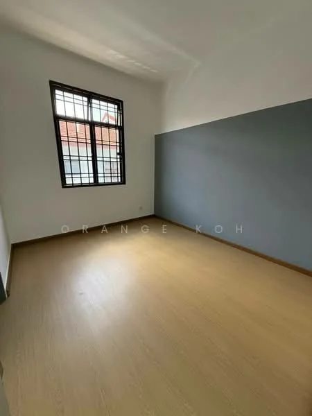Room features: light wood laminate flooring, white painted walls, grey accent wall, large window with grid pattern, natural light, no visible furniture; style: minimalist.