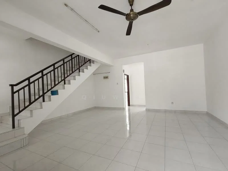 Room features: white painted walls, glossy ceramic tile flooring, ceiling fan, staircase with metal railing, large open space, natural light from windows, no visible furniture, neutral color scheme; style: modern.