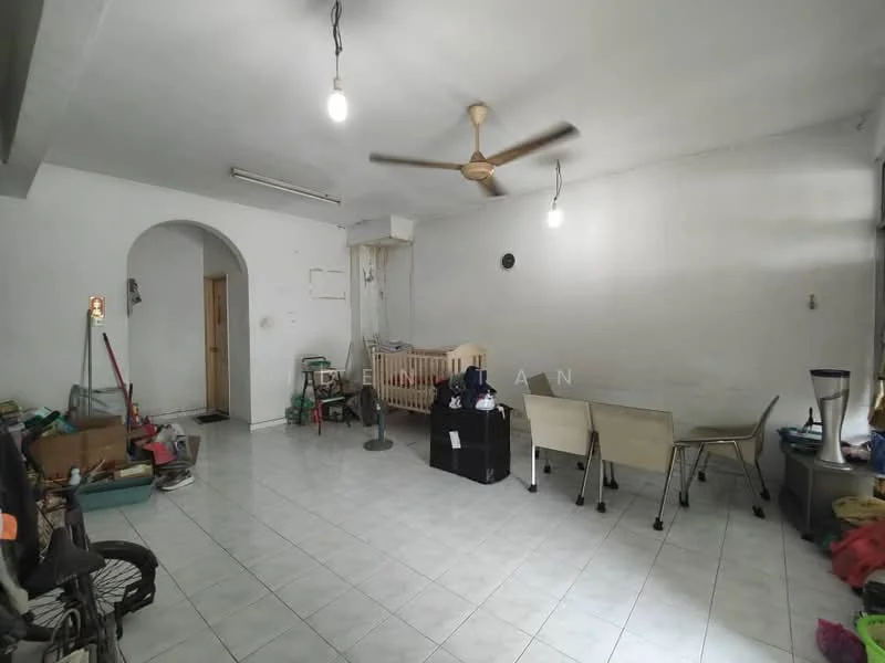 Living features: white painted walls, ceramic tile flooring, ceiling fan, arched doorway, large window, wooden door, furniture including a crib, dining table with chairs, various items and clutter, exposed ceiling, light fixture.