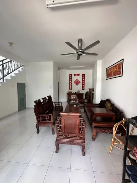 Living features: white painted walls, glossy white tile flooring, 5-blade ceiling fan, wooden dining table, wooden chairs, wooden sofa set, decorative wall art, open layout, natural light from windows, staircase visible in background; style: traditional.