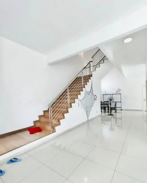 Room features: white painted walls, polished ceramic tile flooring, staircase with metal railing, open layout, natural light from ceiling light, dining table visible in background, sliding door, decorative wall art, red rug on floor, blue slippers on floor; style: modern.