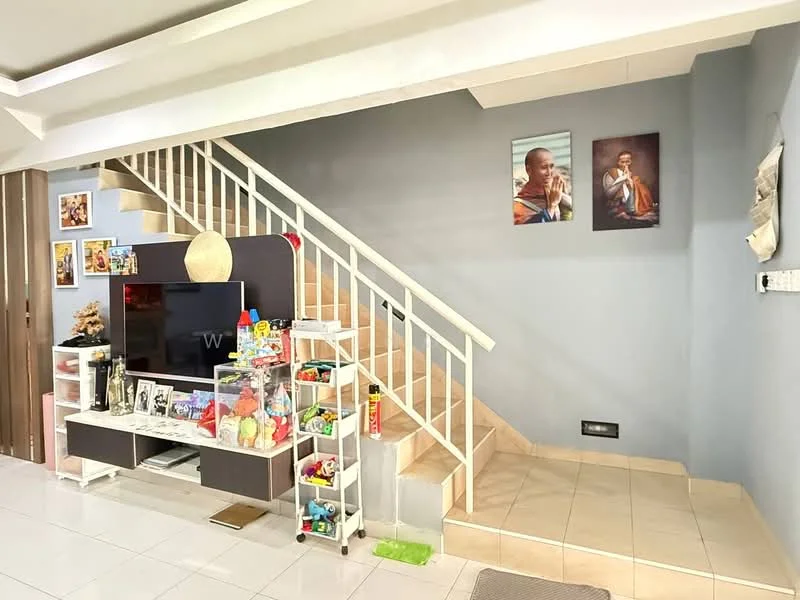 Living features: white painted walls, grey accent wall, ceramic tile flooring, staircase with white railing, TV console, wall-mounted TV, decorative items on shelves, framed artwork on walls, area rug, decorative plants, light fixture on ceiling; style: modern.