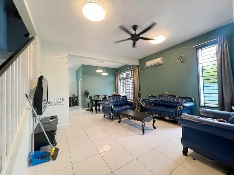 Living features: blue leather sofa set, 3-seater sofa, 2-seater sofa, coffee table, wall-mounted TV, ceiling fan with light, white tiled flooring, light blue painted walls, large windows with metal grills, air conditioning unit, decorative wall clock, dining area visible in background; style: modern.