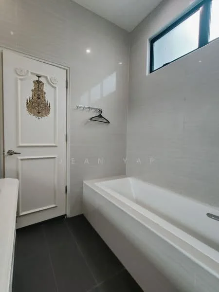 Bathroom features: white bathtub, chrome wall-mounted faucet, grey tile flooring, white tiled walls, small window, hanging clothes hook, decorative door with chandelier design, recessed lighting; style: modern.