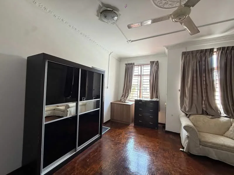 Room features: wooden flooring, white painted walls with crown moulding, ceiling fan, large window with wooden frame, curtains, black wardrobe with mirrored doors, brown wooden chest of drawers, beige fabric sofa; style: modern.