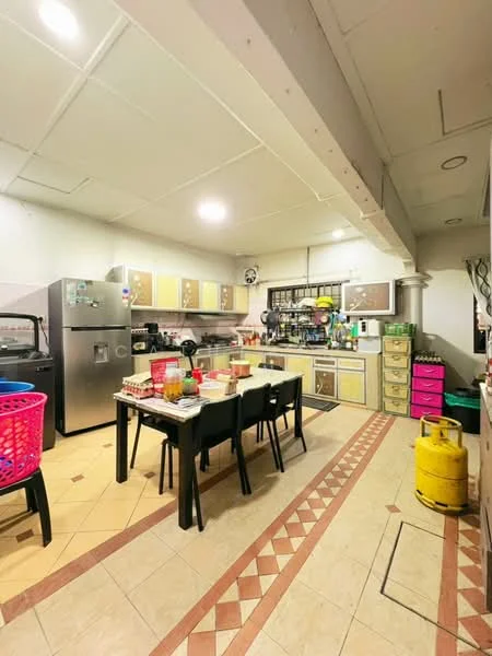 Kitchen features: stainless-steel fridge, built-in oven, freestanding range oven, double-bowl stainless-steel sink, chrome pull-down faucet, laminate countertop, tile backsplash, wood cabinetry with yellow finish, dining table with four chairs, pink storage drawers, gas cylinder, ceramic tile flooring, recessed ceiling lights, wall-mounted shelves; style: modern.