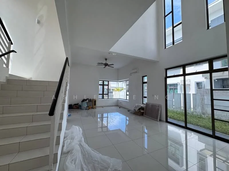Living features: white painted walls, glossy ceramic tile flooring, 5-blade ceiling fan with light, large floor-to-ceiling windows, sliding glass door, natural light from multiple angles, open layout, high ceiling; style: modern; view: garden. Room features: staircase with white railing, unfinished space with construction materials.
