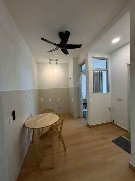 Room features: light wood flooring, white painted walls, ceiling fan, recessed downlights, large window with natural light, round wooden dining table, two wooden chairs, laundry area visible through window, wall-mounted intercom, doorway leading to another room; style: modern.