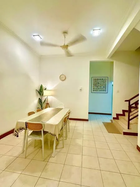 Dining features: dining table with tablecloth, 6 dining chairs, ceiling fan, white painted walls, tile flooring, wall clock, indirect lighting, green plant in corner; style: modern. Room features: staircase, doorway leading to another room.
