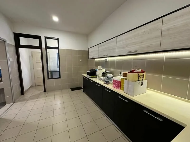Kitchen features: black cabinetry with wood accents, light-colored countertop, tile backsplash, built-in overhead cabinets, under-cabinet lighting, ceramic tile flooring, single-bowl stainless-steel sink, chrome faucet, open shelving, kitchen appliances visible, dining plates and utensils on countertop; style: modern. Room features: doorway leading to another room, window with black frame.