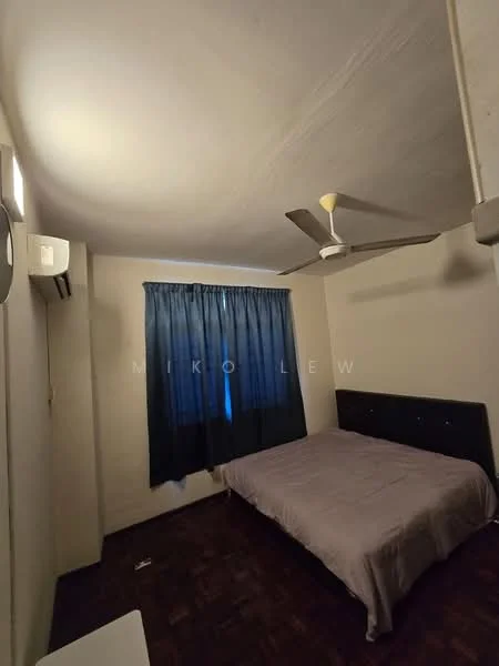 Bedroom features: queen-size bed, grey bedspread, wooden flooring, white painted walls, ceiling fan, wall-mounted air conditioning unit, black headboard, black curtains, window with natural light.