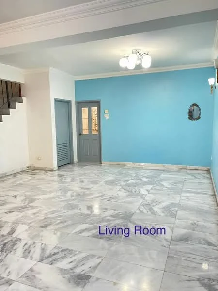 Living features: marble flooring, blue painted accent wall, white painted walls, 3-bulb ceiling light fixture, wall sconce, door with glass panel, mirror on wall, staircase visible in background; style: modern.
