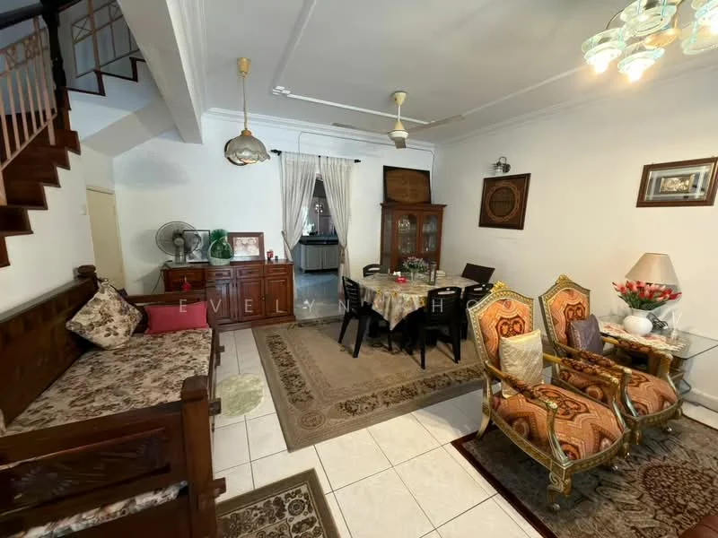 Living features: white painted walls, tile flooring, ceiling fan, chandelier, wooden staircase, wooden sofa with cushions, dining table with chairs, decorative area rug, framed artwork, wooden cabinet, potted plants, curtains, ornate armchairs; style: traditional.