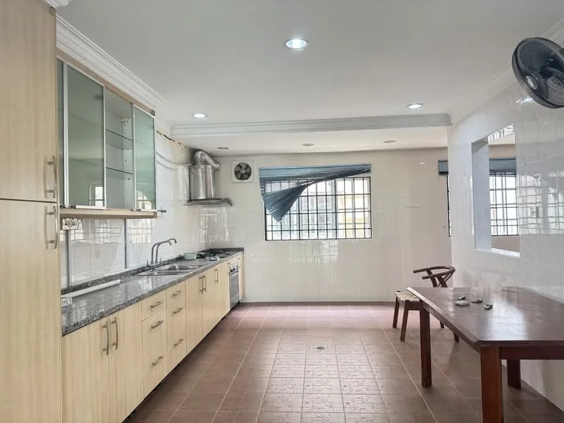 Kitchen features: light wood cabinetry, black granite countertop, double-bowl stainless-steel sink, chrome pull-down faucet, built-in stainless-steel range hood, ceramic tile flooring, white tiled walls, window with grid pattern, ceiling lights, wall-mounted ceiling fan, wooden dining table, two wooden chairs; style: modern.