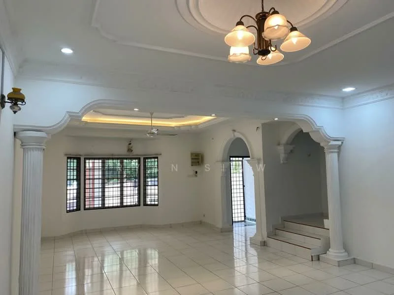 Living features: white painted walls, polished tile flooring, tray ceiling with crown moulding, 3-blade ceiling fan, chandelier with multiple bulbs, arched doorways, large windows with black grills, staircase leading to another level; style: modern.