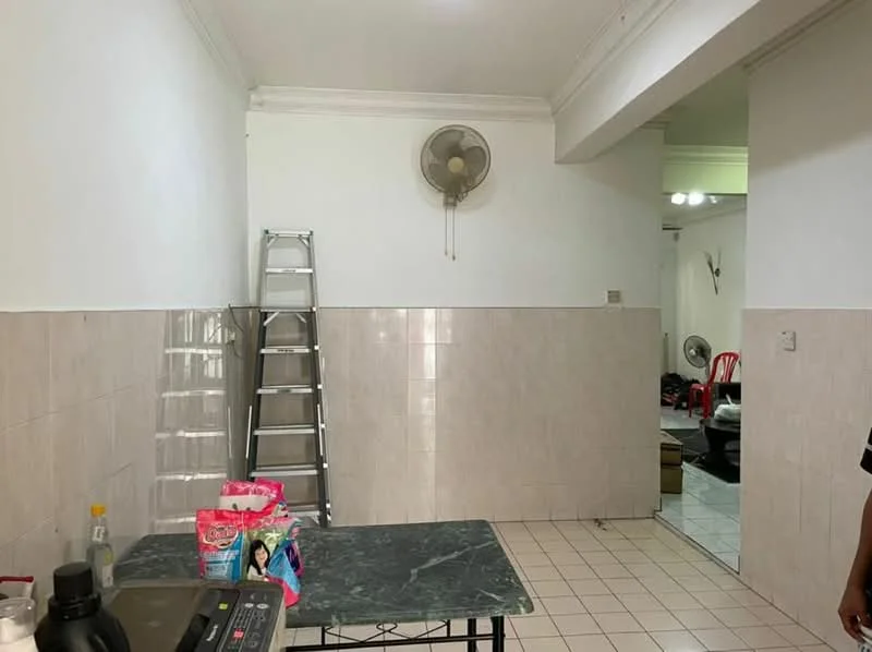 Kitchen features: white painted walls, cream tiled backsplash, white tiled flooring, ceiling fan, kitchen countertop, stainless-steel sink, ladder, plastic storage containers, decorative items, open layout.