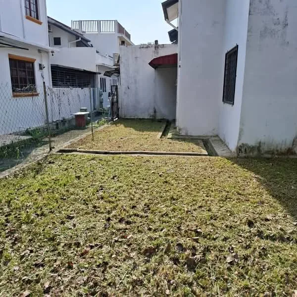 Exterior type: detached bungalow; features: fenced yard, manicured lawn, concrete pathway, adjacent building, clear sky, grass area; style: modern.