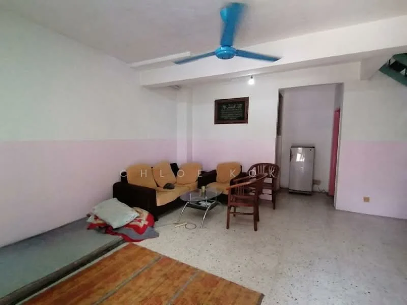 Living features: light pink painted walls, white painted walls, ceiling fan, 3-seater fabric sofa in brown, glass coffee table, wooden chair, area rug, tile flooring, refrigerator.