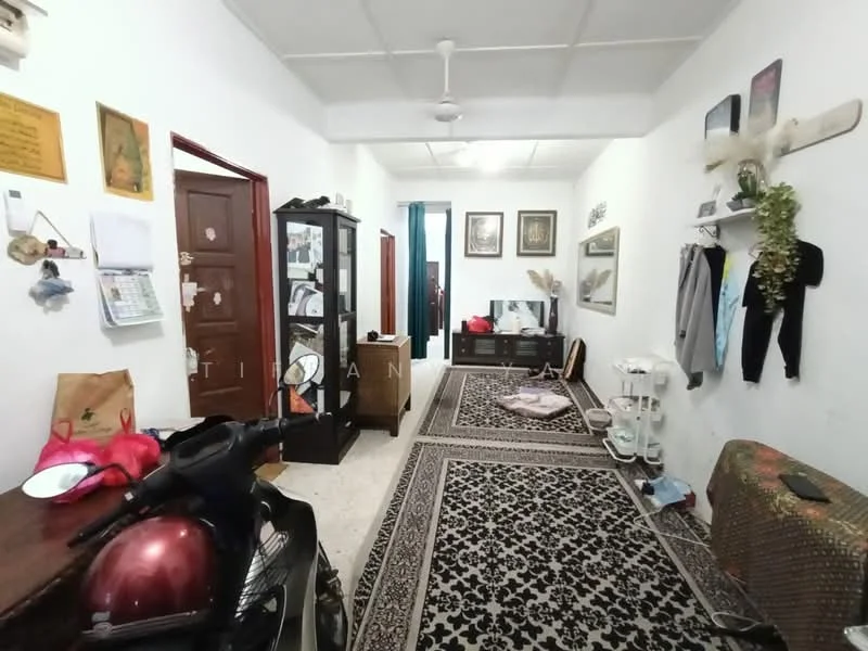 Room features: white painted walls, wall-mounted shelf, decorative wall art, black and white patterned area rug, wooden door, glass display cabinet, ceiling fan, wooden console table, decorative mirror, clothing rack, bicycle, various decorative items; style: modern.
