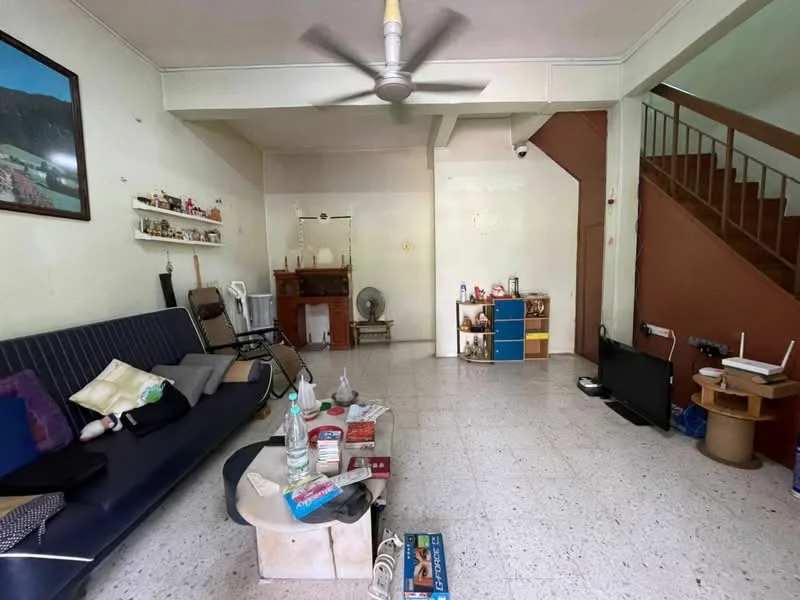 Living features: sofa with cushions, ceiling fan, coffee table, TV console, wall-mounted TV, decorative shelves, staircase, tile flooring, wall with light paint, decorative items on shelves, fan, open space layout.